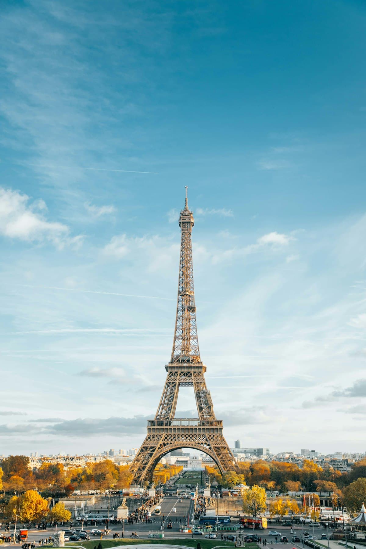The Eiffel Tower in Paris under a blue sky